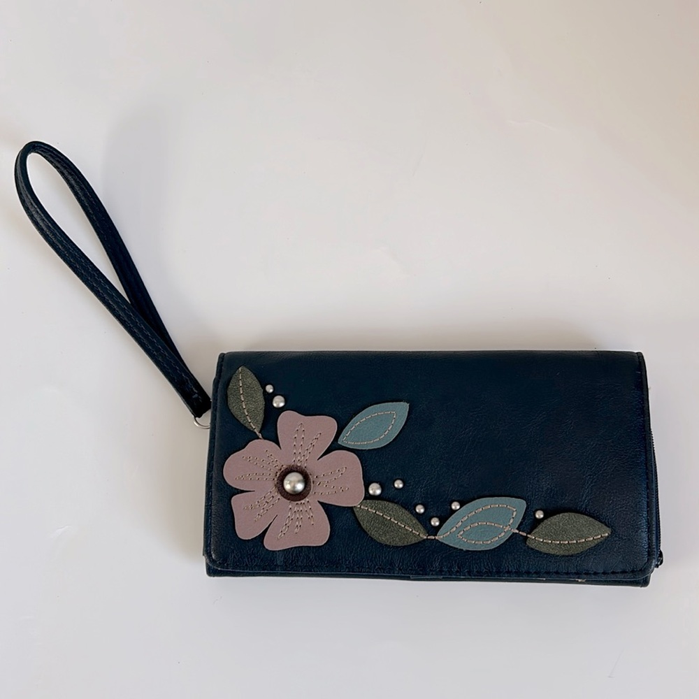 Relic wristlet.  Navy with pretty flowers design.  NWOT